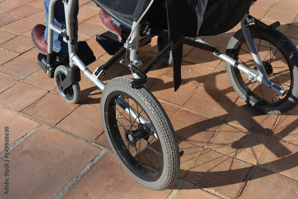 Disabled person in a wheel chair, high angle view