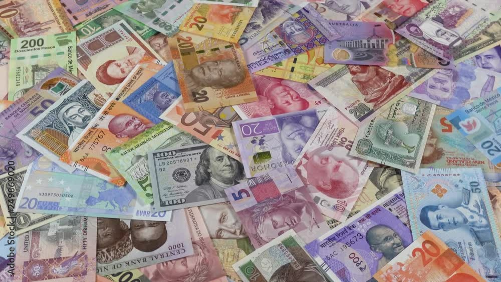 World currencies notes slow rotating. World money, economy. Low angle. 4K stock video footage World currencies notes slow rotating. World money, economy. Low angle. 4K stock video footage