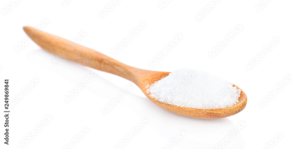 Salt in wooden spoon on white background Salt in wooden spoon on white background