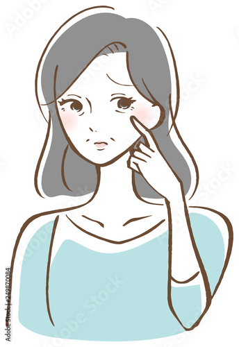 目元を気にする中年女性　困り顔