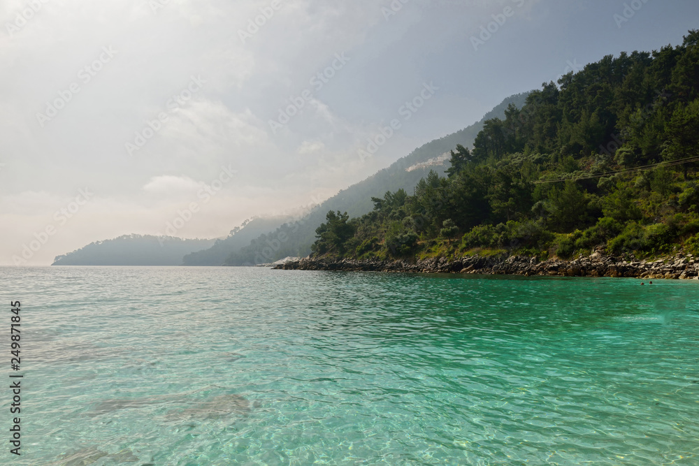 Tassos marble beach in the summer time