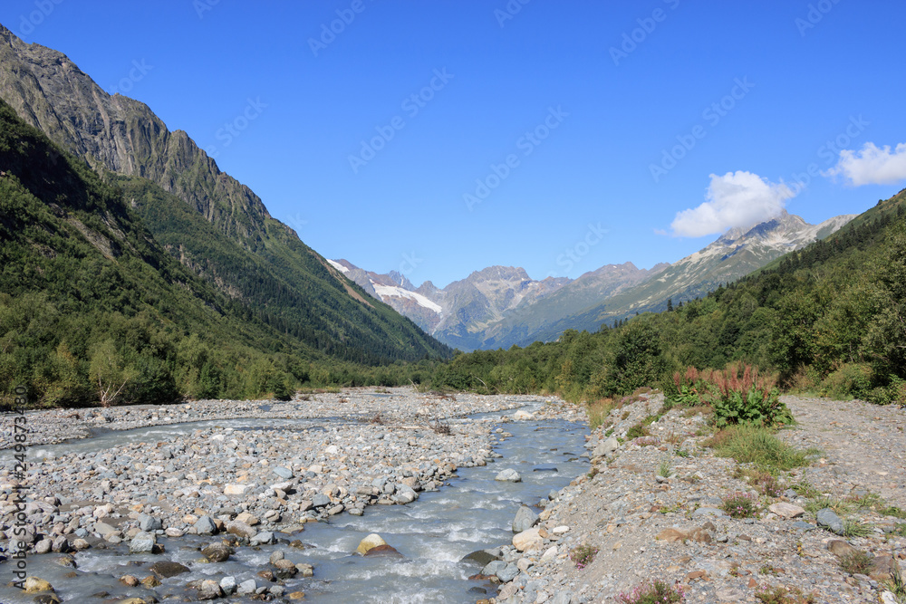 Fototapeta premium Close up view mountains and river scenes in national park Dombai, Caucasus