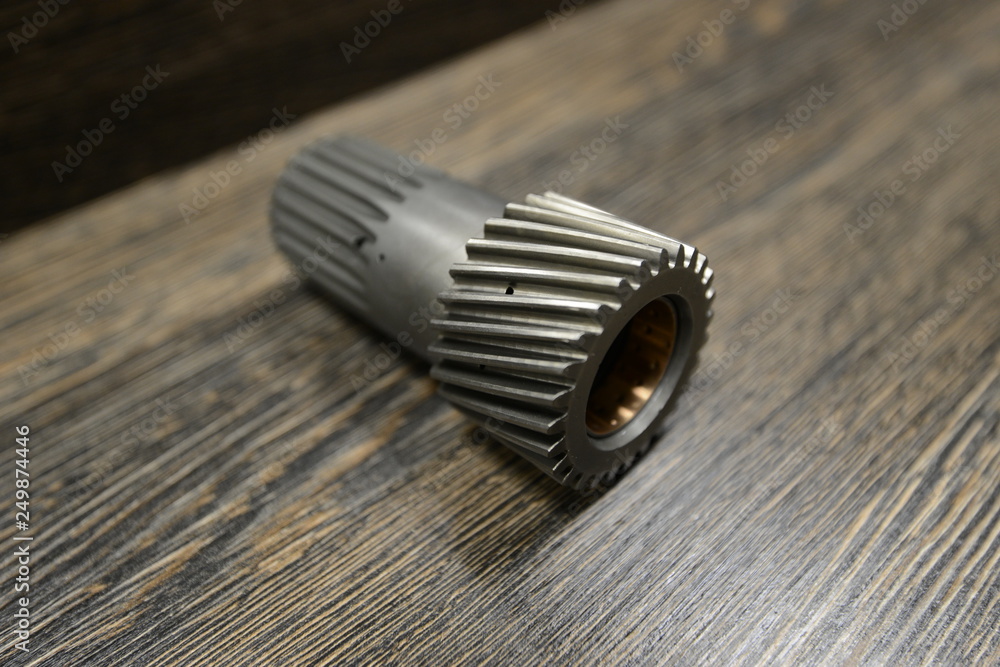 Automatic transmission spare parts on wooden background Automatic transmission spare parts on wooden background