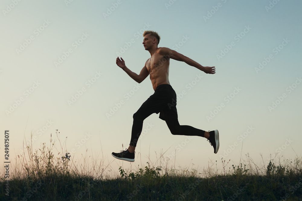 Sportsman in motion of running in nature Sportsman in motion of running in nature