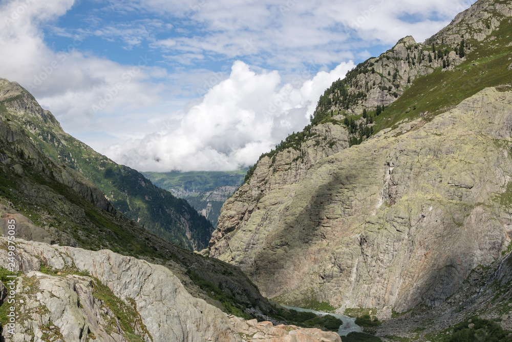Closeup mountains scenes, walk to Trift Bridge in national park Switzerland