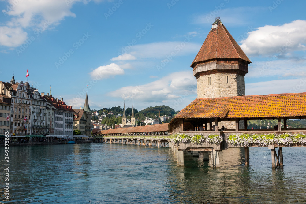 anoramic view of city center of Lucerne with famous Chapel Bridge and lake