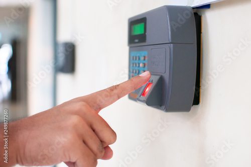 Employee scan fingerprint to record working time 