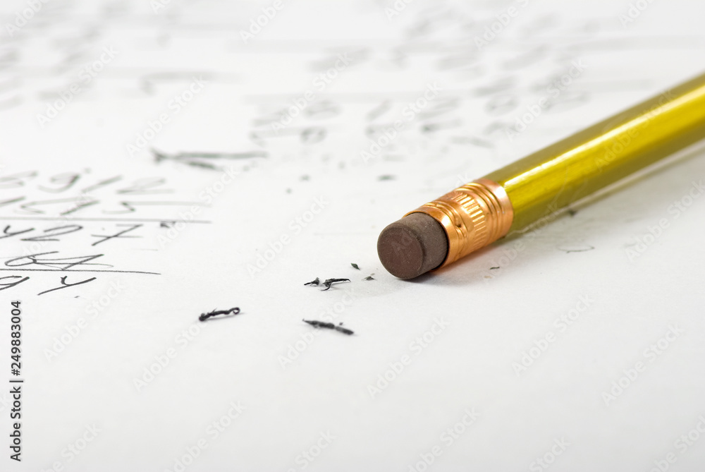 Fototapeta premium image of a pencil with rubber on a paper with inscription