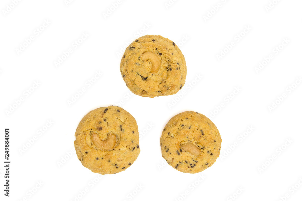 butter cookies with cashew nuts isolated on white background, top view butter cookies with cashew nuts isolated on white background, top view