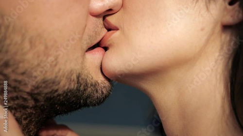 couple kisses on lips photo
