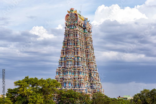 The north gopuram of the Meenakshi temple in Madurai, India. A Gopuram is a monumental gatehouse tower, usually ornate, at the entrance of a Hindu temple usually found in the southern India photo