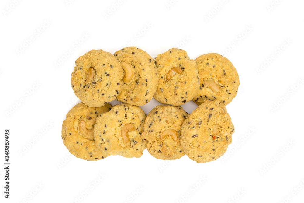 butter cookies with cashew nuts isolated on white background, top view butter cookies with cashew nuts isolated on white background, top view