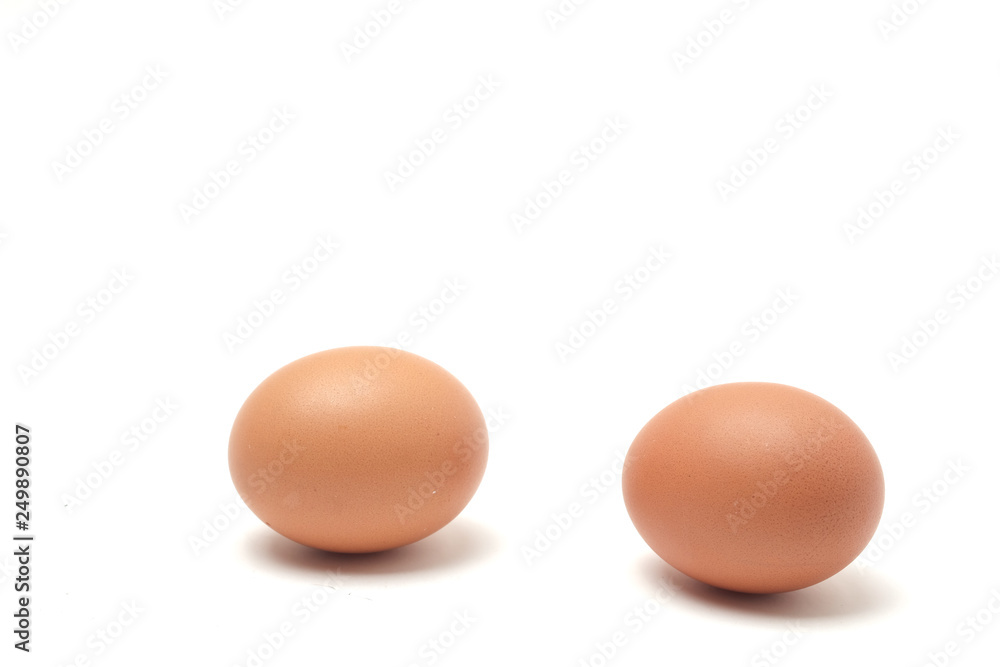 Many eggs on a white scene