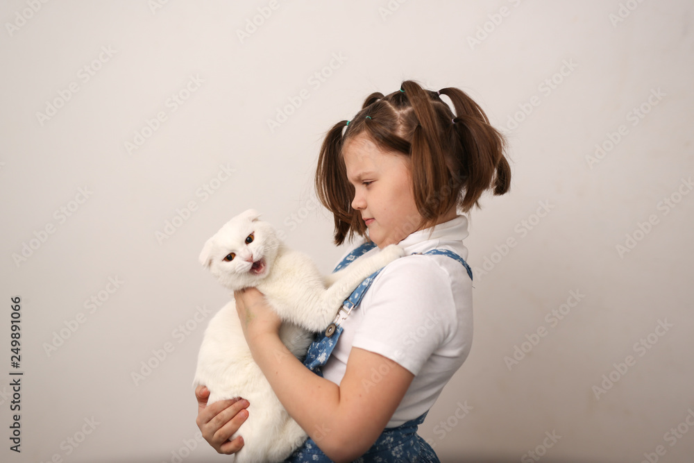 Girl child offends a cat, animal abuse Girl child offends a cat, animal abuse