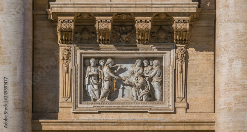 "Saint Peter receiving the Keys" by Ambrogio Buonvicino over the main entrance to Saint Peter Basilica in Rome, Italy.