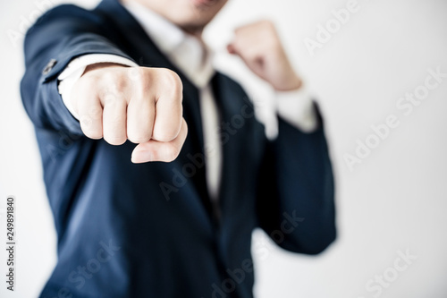 Business Fighting to success Concept. Businessman with fighting pose. © Mivolchan19