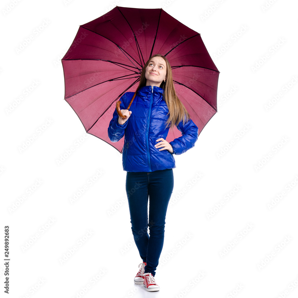 © Kabardins photo - Woman in blue jacket with umbrella in hand goes walking on white background. Isolation