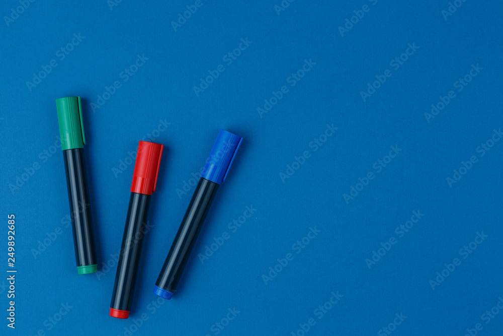 markers on the blue table top view markers on the blue table top view