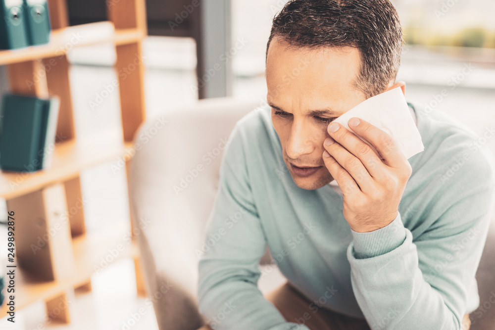 Mature man suffering from strong migraine Mature man suffering from strong migraine