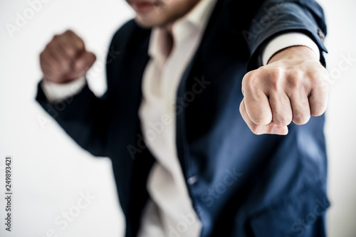 Business Fighting to success Concept. Businessman with fighting pose. © SP56