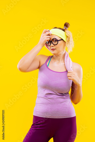 Young woman feeling exhausted after long time at gym