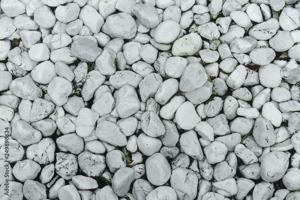 White pebbles on the bottom of the pool. White pebbles on the bottom of the pool.