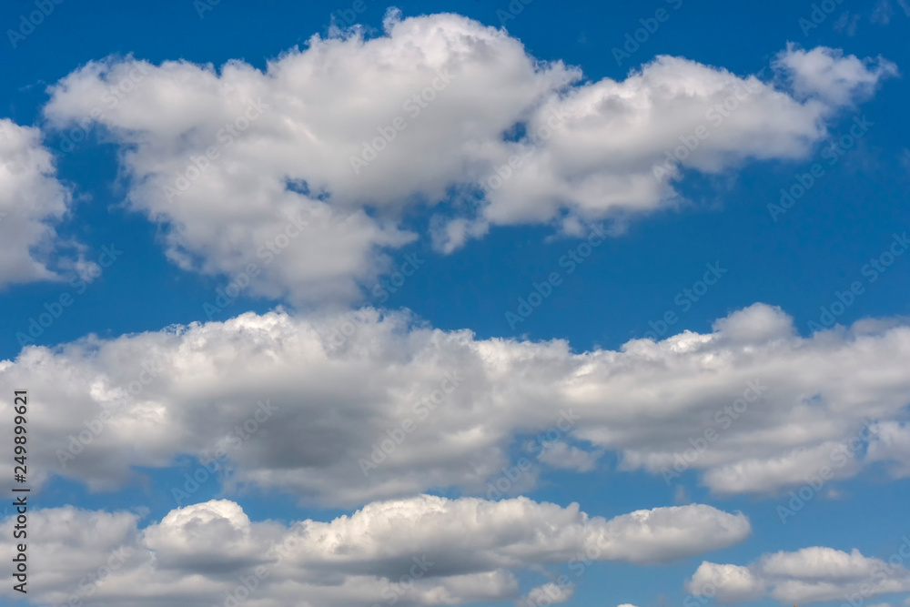 Obraz premium Blue sky with white clouds.