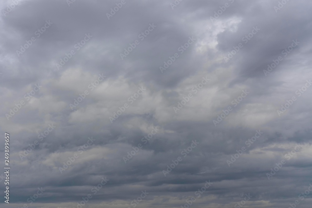 Dark clouds overcast the sky before the rain. Dramatic pre-storm view of the sky. Dark clouds overcast the sky before the rain. Dramatic pre-storm view of the sky.