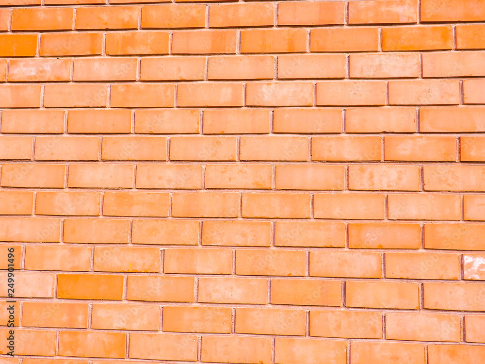 Red brown block brick wall Beautifully arranged texture backgrou Red brown block brick wall Beautifully arranged texture backgrou