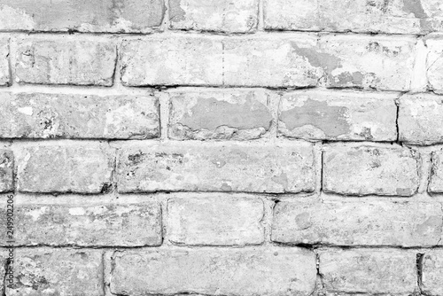 Texture, brick, wall, it can be used as a background . Brick texture with scratches and cracks