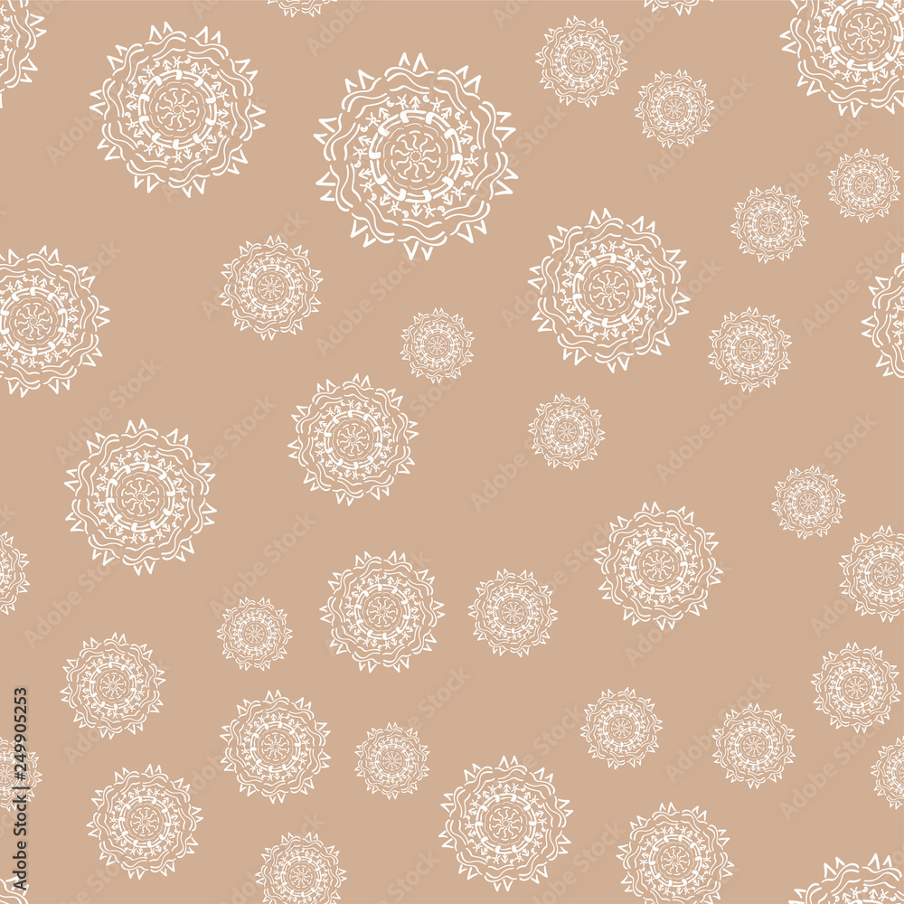Mandala seamless pattern on a colored background