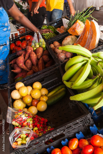 Fresh local produce is on sale at a farmers market in the Caribbean. This selection of fruit and vegetables is notural and organic and healthy to consume photo