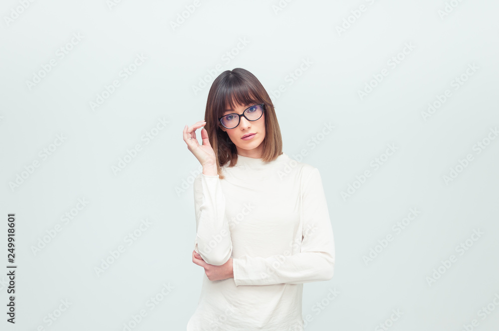 Portrait of beautiful woman in eyeglasses in office company Portrait of beautiful woman in eyeglasses in office company