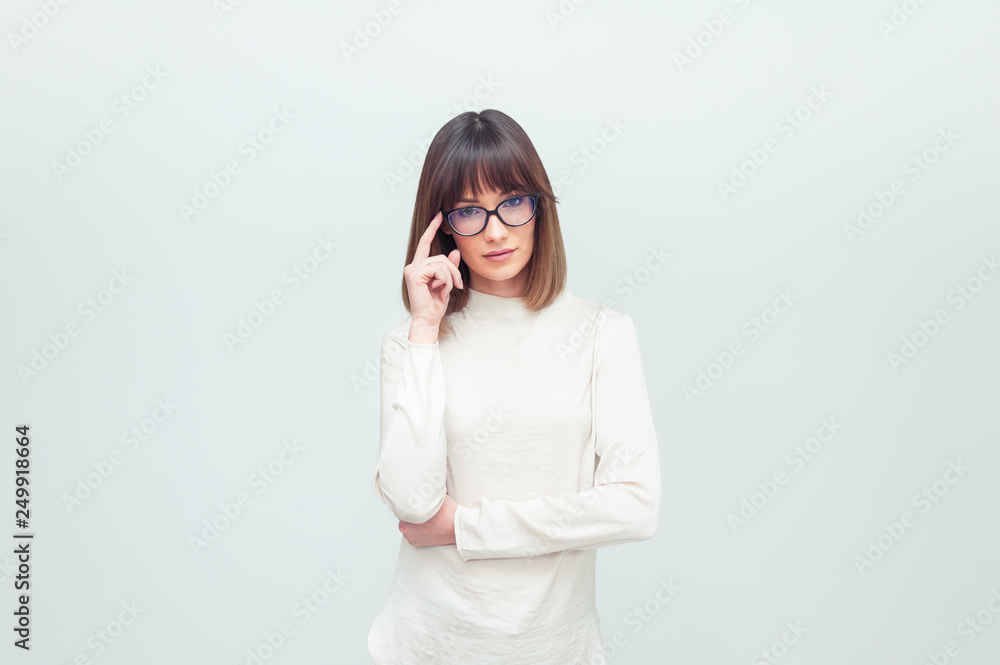 Portrait of beautiful woman in eyeglasses in office company Portrait of beautiful woman in eyeglasses in office company