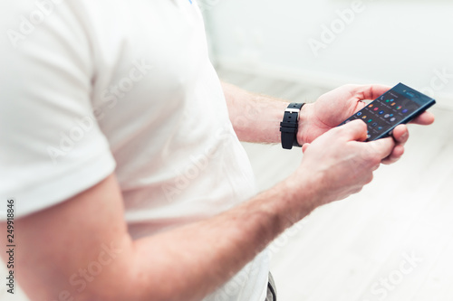 Busy man using smartphone