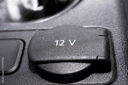 Obraz na płótnie Car 12 volt electrical power charging outlet socket. w salonie