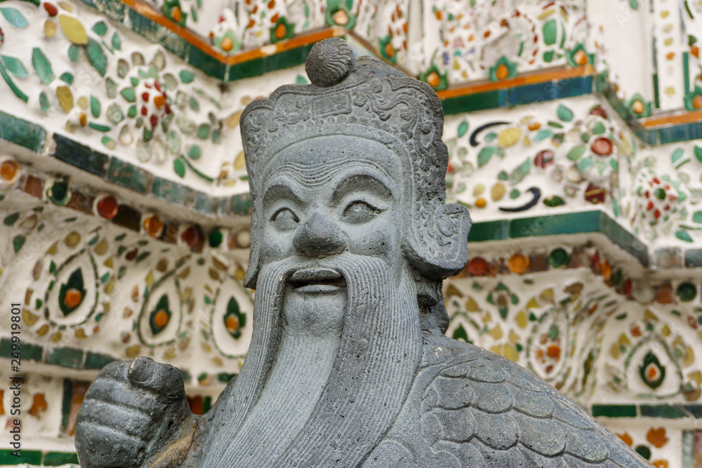 Obraz premium Statue of Giant at Wat Arun. Wat Arun or Temple of the Dawn is one of a famous Buddhist temple in the Bangkok, Thailand