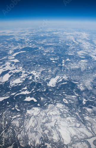 High altitude view of the frozen tundra in northern Canada.