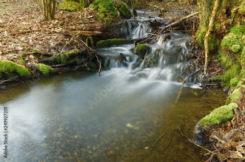 Fototapeta Naklejka Na Ścianę i Meble -  waterfall in the forest.long exposure water