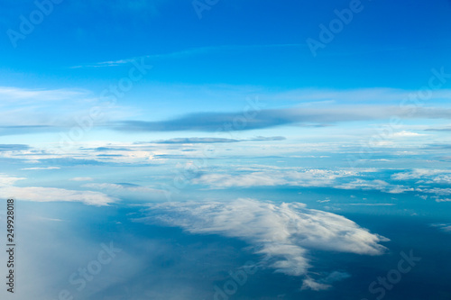 blue sky background with tiny clouds © Pakhnyushchyy