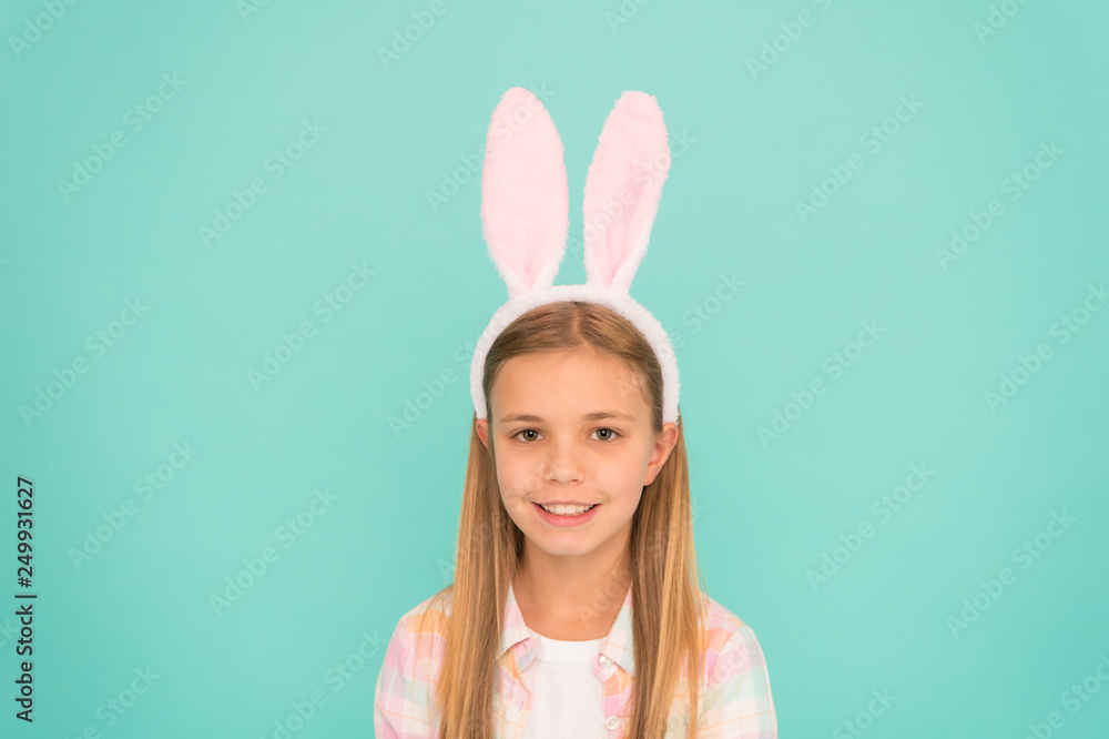 Styling in her Sundays best. Cute little girl wearing bunny ears headband. Small girl child in easter bunny style. Fashion accessory for easter costume party. Looking pretty in easter bunny attire Styling in her Sundays best. Cute little girl wearing bunny ears headband. Small girl child in easter bunny style. Fashion accessory for easter costume party. Looking pretty in easter bunny attire