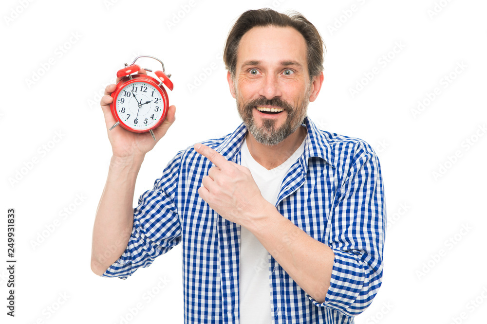 Foto de Please observe time. Mature man pointing finger at alarm clock. Mature timekeeper with