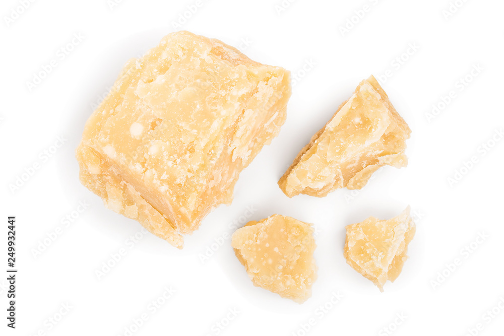 Parmesan cheese pieces isolated on white background. Closeup. Top view. Flat lay