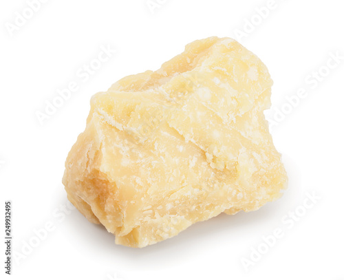 Parmesan cheese piece isolated on white background. Closeup