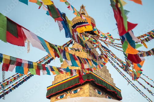 Boudha eyes and prayer flags.  Boudhanath stupa. Kathmandu, Nepal
