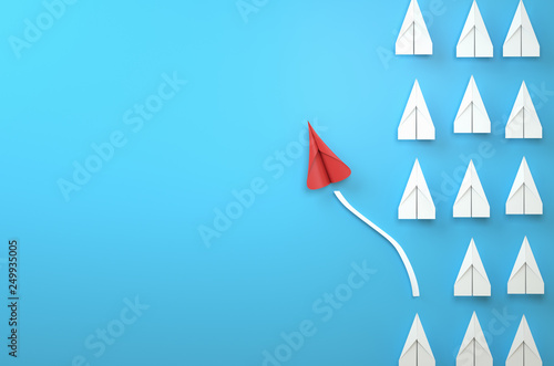 paper plane leadership concept - red paper plane leading the row