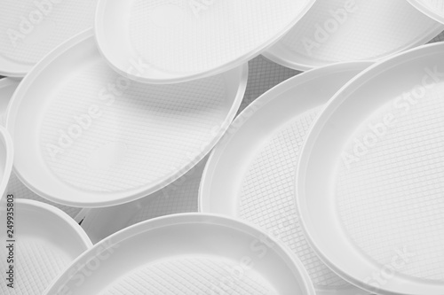 White plastic plates close-up