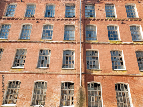 Old architectural plant. Old abandoned red brick factory.Ancient construction.