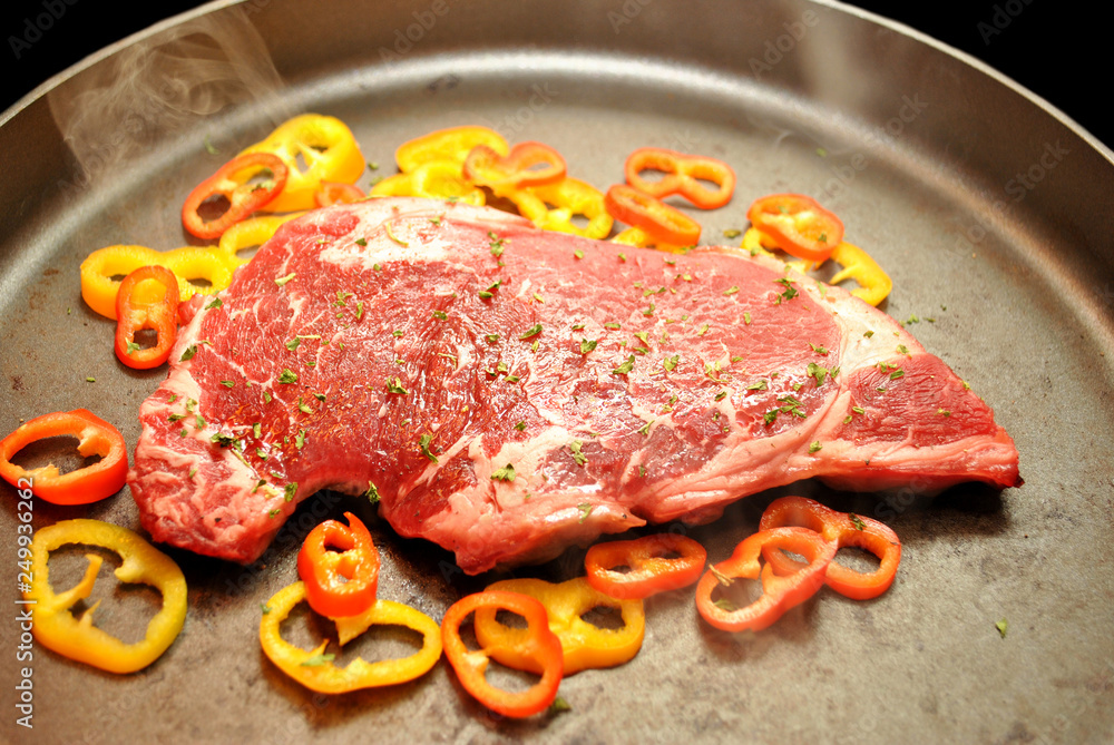 Prime Rib Steak Cooking with Sweet Peppers & Parsley