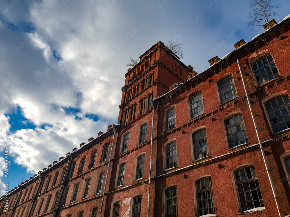 Old architectural plant. Old abandoned red brick factory.Ancient construction.